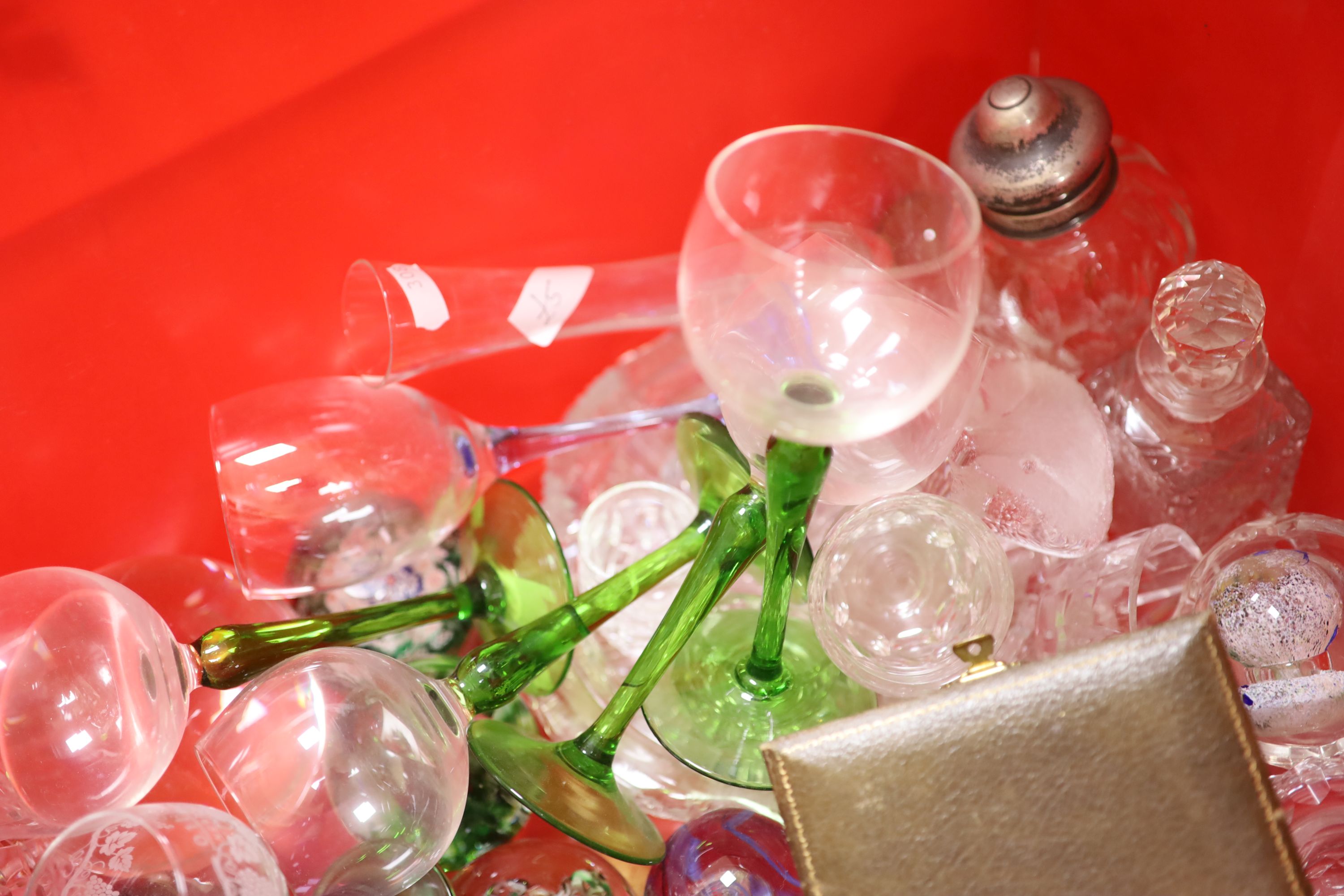 A collection of mixed glassware and glass paperweights